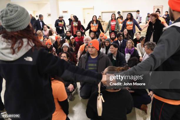 Immigration activists reherse civil disobediance ahead of a protest on February 7, 2018 in Washington D.C. A coalition of activists came from across...