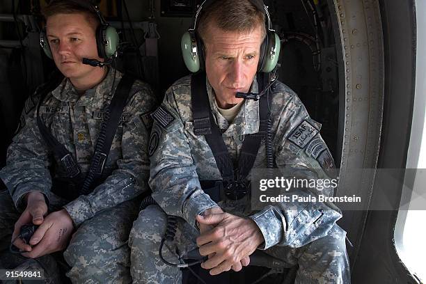 Commander General Stanley A. McChrystal sits in the helicopter after a lengthy conference meeting with military officials October 7, 2009 at the...