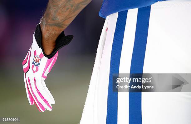 Indianapolis Colts player is pictured wearing pink gloves during the NFL game against the Seattle Seahawks at Lucas Oil Stadium on October 4, 2009 in...