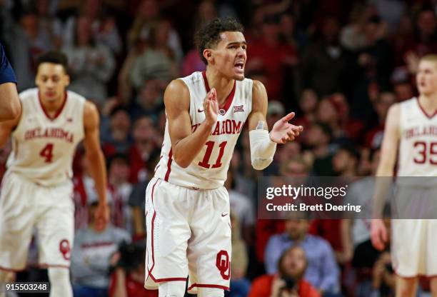 Trae Young of the Oklahoma Sooners tries to rally his team against the West Virginia Mountaineers at Lloyd Noble Center on February 5, 2018 in...