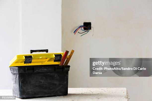 plastic toolbox set on work table - toolbox stock pictures, royalty-free photos & images