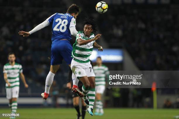 Sporting's Portuguese forward Gelson Martins jumps with Porto's Brazilian defender Felipe during the Portuguese Cup 2017/18, match between FC Porto...