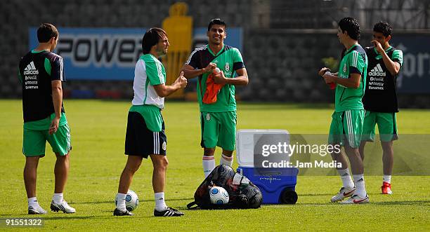 Mexican national soccer team players Cuauhtemoc Blanco and Guillermo Franco in action during their training session at the Mexican Football...