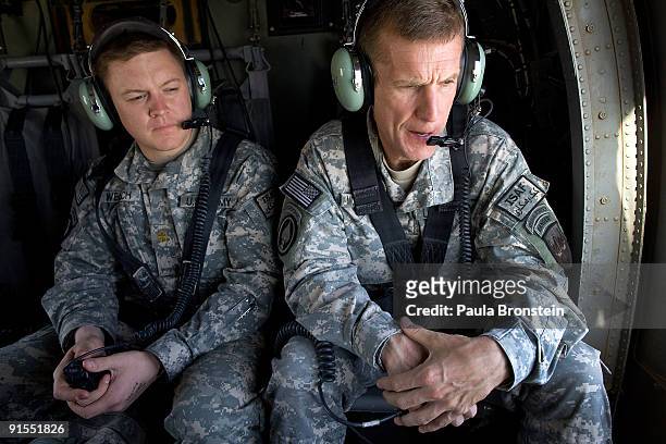 Commander General Stanley A. McChrystal sits in the helicopter after a lengthy conference meeting with military officials October 7, 2009 at the...