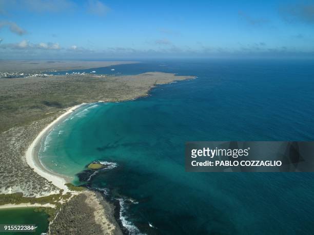 Aerial view of the Tortuga Bay area in Santa Cruz Island, Galapagos, Ecuador, on January 21, 2018. - Ecuador's growing tourism threatens the...