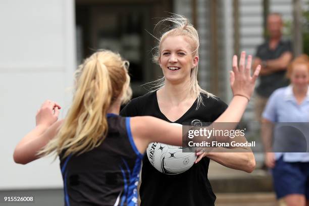 Silver fern Shannon Francois plays a game with Auckland Normal Intermedaite students during the New Zealand Netball Commonwealth Games Team...