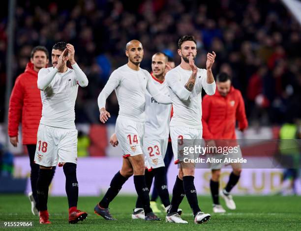 Guido Pizarro of Sevilla FC celebrates their victory with teammate Sergio Escudero and Miguel Layun after the Copa del Rey semi-final second leg...