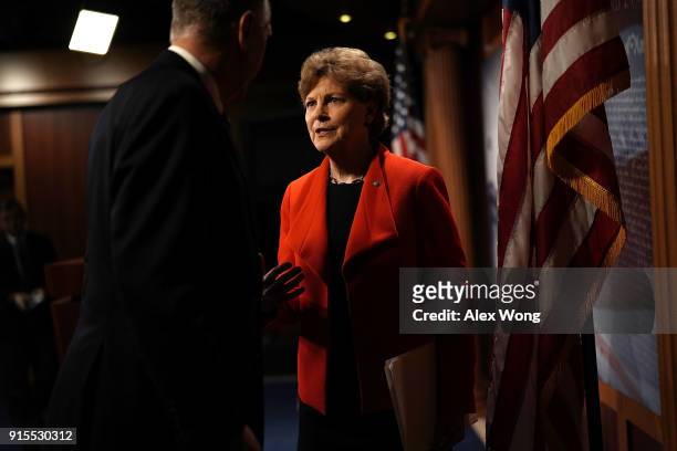 Sen. Jeanne Shaheen talks to Sen. Thom Tillis after a news conference at the Capitol February 7, 2018 in Washington, DC. Sen. Shaheen and Sen. Joni...