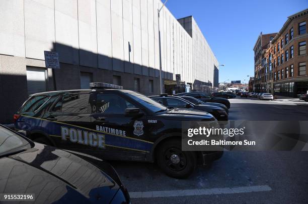 Marked police cars outside the Bishop L. Robinson Sr. Building, Baltimore Police headquarters.