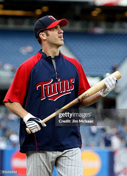 Joe Mauer of the Minnesota Twins looks on during batting practice before Game One of the ALDS against the New York Yankees during the 2009 MLB...