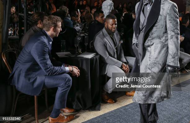 Player Davis Webb and actor Winston Duke attend the Joseph Abboud Men's Fashion Show during New York Fashion Week Mens' at Hotel Wolcott Ballroom on...