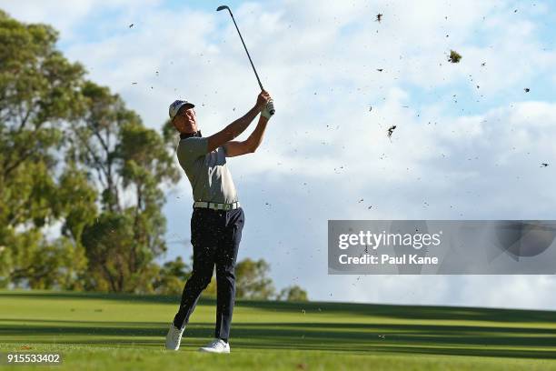 Brett Rumford of Australia plays his second shot on the 13th hole during day one of the World Super 6 at Lake Karrinyup Country Club on February 8,...