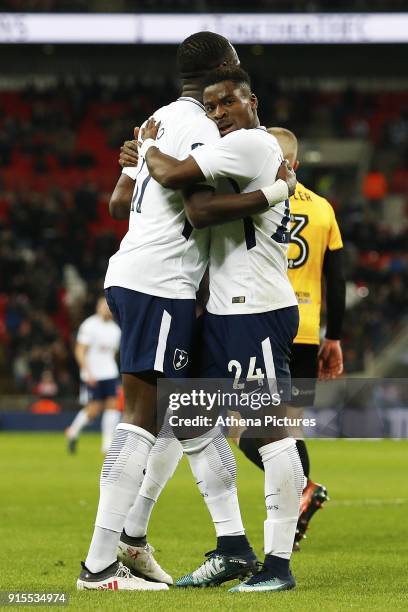 Moussa Sissoko of Tottenham Hotspur celebrates scoring his side's first goal of the match with Serge Aurier after his shot deflects off Dan Butler of...