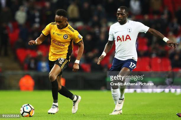 Shawn McCoulsky of Newport County, is marked by Moussa Sissoko of Tottenham Hotspur during the Fly Emirates FA Cup Fourth Round Replay match between...