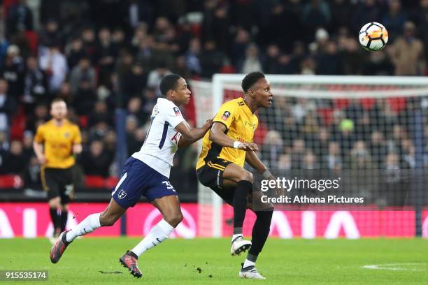 Shawn McCoulsky of Newport County is challenged by Kyle Walker-Peters of Tottenham Hotspur during the Fly Emirates FA Cup Fourth Round Replay match...