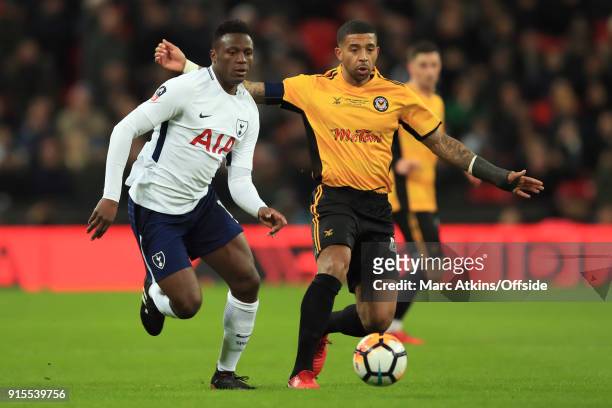 Victor Wanyama of Tottenham Hotspur in action with Joss Labadie of Newport County during the FA Cup Fourth Round replay between Tottenham Hotspur and...
