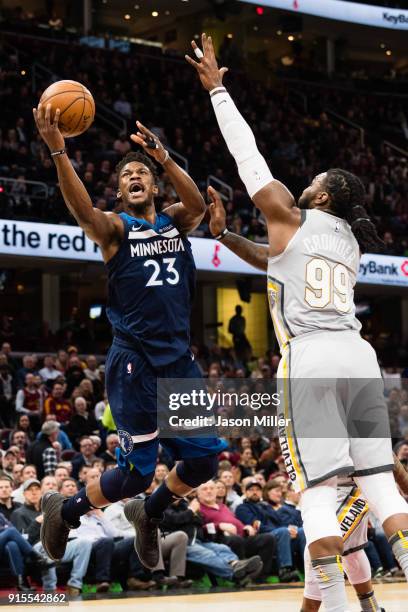 Jimmy Butler of the Minnesota Timberwolves scores over Jae Crowder of the Cleveland Cavaliers during the first half at Quicken Loans Arena on...