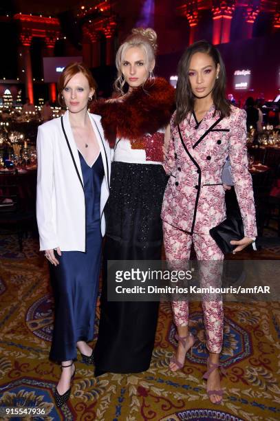 Models Karen Elson, Andreja Pejic, and Joan Smalls attend the 2018 amfAR Gala New York at Cipriani Wall Street on February 7, 2018 in New York City.