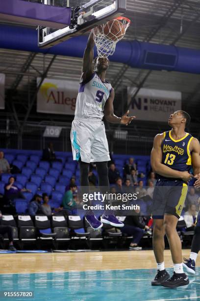 Mangok Mathiang of the Greensboro Swarm dunks the ball against the Fort Wayne Mad Ants during the NBA G-League on February 7, 2018 at Greensboro...