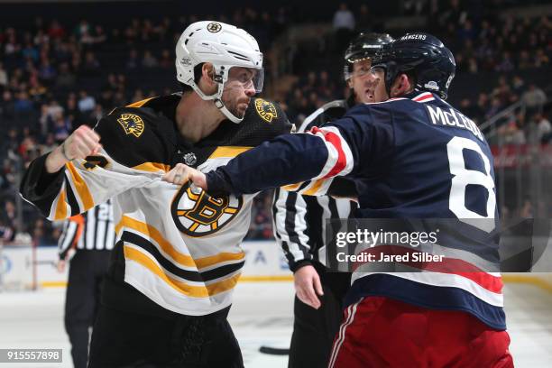 Cody McLeod of the New York Rangers fights Adam McQuaid of the Boston Bruins in the third period at Madison Square Garden on February 7, 2018 in New...