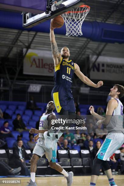 Trey McKinney-Jones of the Fort Wayne Mad Ants dunks the ball against the Greensboro Swarm during the NBA G-League on February 7, 2018 at Greensboro...