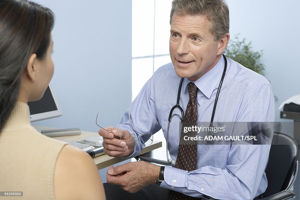 Doctor giving medical advice to patient