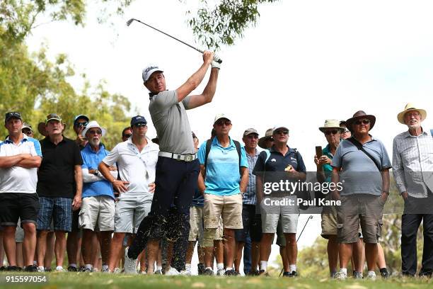 Brett Rumford of Australia plays his second shot on the 7th hole during day one of the World Super 6 at Lake Karrinyup Country Club on February 8,...