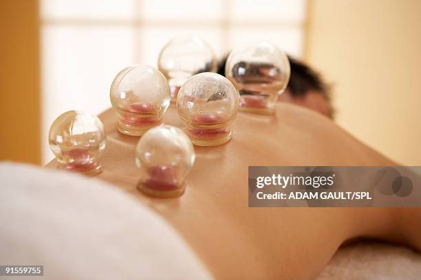 fire cupping - hands cupped stock pictures, royalty-free photos & images