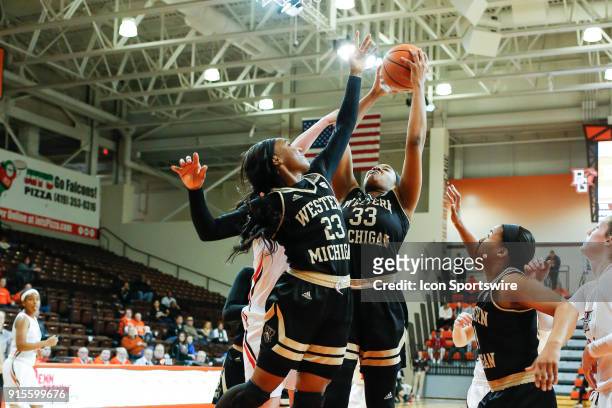 Western Michigan Broncos center Marley Hill and Western Michigan Broncos guard Jordan Walker battle to grab a rebound during the second half of a...