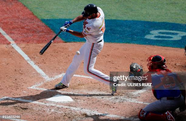 Luis Sardinas, Caribes de Anzoategui of Venezuela, bats against Criollos de Caguas of Puerto Rico during Baseball Series at the Charros Jalisco...