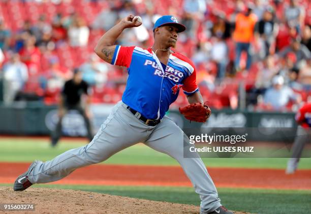 Pitcher Anthony Garcia, Criollos de Caguas of Puerto Rico, throws against Caribes de Anzoategui of Venezuela during Baseball Series at the Charros...