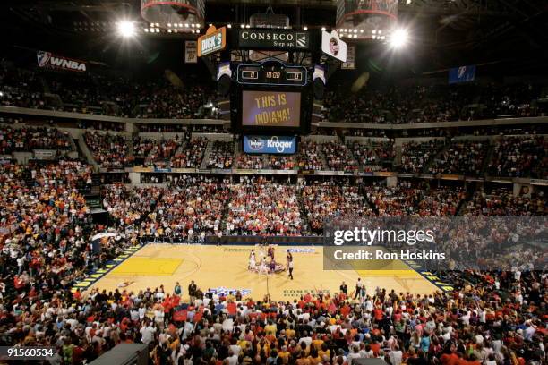 Tammy Sutton-Brown of the Indiana Fever jumps against Tangela Smith of the Phoenix Mercury during Game Four of the WNBA Finals on October 7, 2009 at...