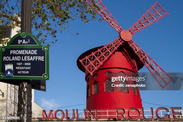 moulin rouge street in paris - red light district paris stock pictures, royalty-free photos & images