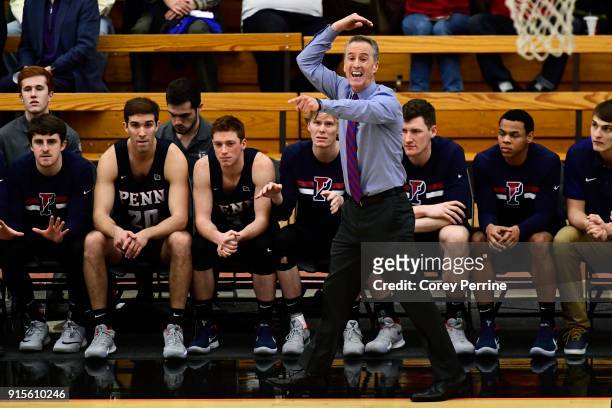 Head coach Steve Donahue of the Pennsylvania Quakers calls out to his team against the Princeton Tigers during the first half at L. Stockwell Jadwin...