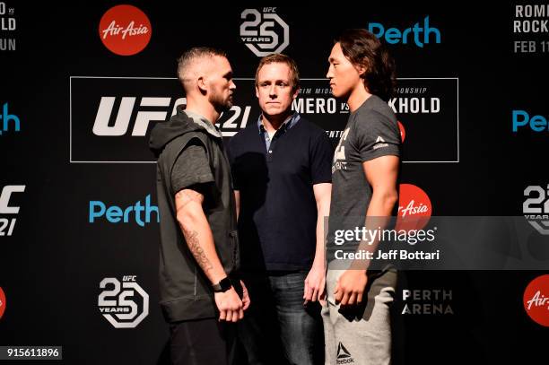 Opponents Damien Brown of Austrailia and Dong Hyun Kim of South Korea face off during the UFC 221 Ultimate Media Day at Hyatt Regency on February 8,...