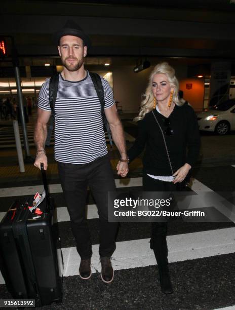 Brooks Laich and Julianne Hough are seen at LAX on February 07, 2018 in Los Angeles, California.