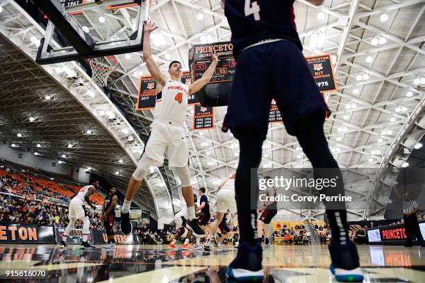 Mike LeBlanc of the Princeton Tigers looks to block an inbound pass from Darnell Foreman of the Pennsylvania Quakers during the second half at L....