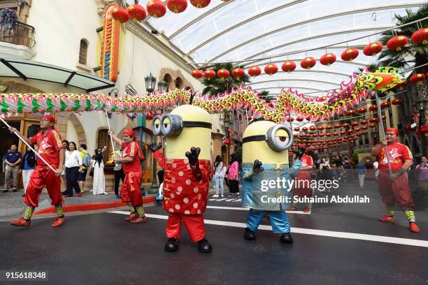 Minions" character from the movie Despicable Me joins in a dragon dance procession at Universal Studios Singapore at Resorts World Sentosa on...
