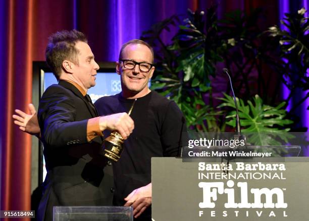 Actors Sam Rockwell and Clark Gregg speak onstage with The American Riviera Award at The American Riviera Award Honoring Sam Rockwell during The 33rd...