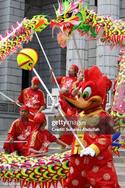 Woody Woodpecker joins in a dragon dance procession at Universal Studios Singapore at Resorts World Sentosa on February 8, 2018 in Singapore. From 9...