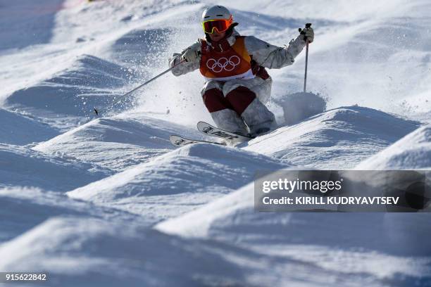 Canada's Andi Naude competes in a moguls training session on the eve of the Pyeongchang 2018 Winter Olympic Games at the Phoenix Park in Pyeongchang...