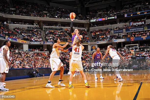 Diana Taurasi of the Phoenix Mercury shoots against Tully Bevilaqua of the Indiana Fever during Game Four of the WNBA Finals on October 7, 2009 at...