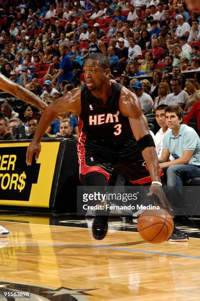 Dwyane Wade of the Miami Heat drives against the Orlando Magic during the pre-season game on October 7, 2008 at Amway Arena in Orlando, Florida. NOTE...