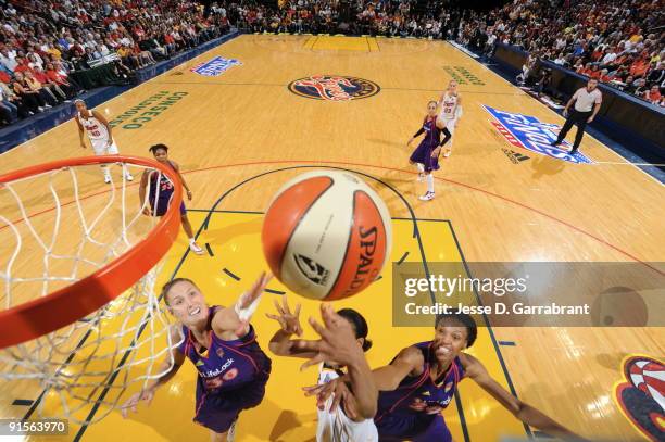 Nicole Ohlde and DeWanna Bonner of the Phoenix Mercury rebounds during Game Four of the WNBA Finals on October 7, 2009 at Conseco Fieldhouse in...