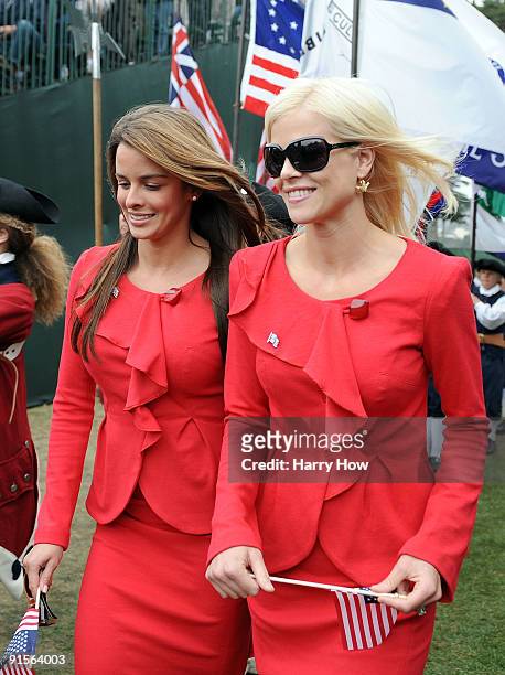 Elin Woods and Yvette Prieto make their way to their seats during Opening Ceremony of The Presidents Cup at Harding Park Golf Course on October 7,...
