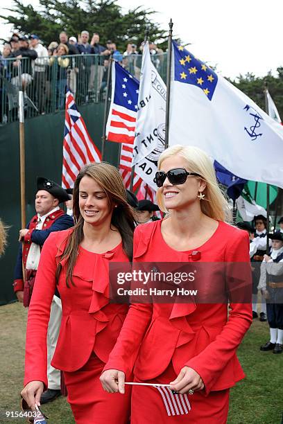 Elin Woods and Yvette Prieto make their way to their seats during Opening Ceremony of The Presidents Cup at Harding Park Golf Course on October 7,...