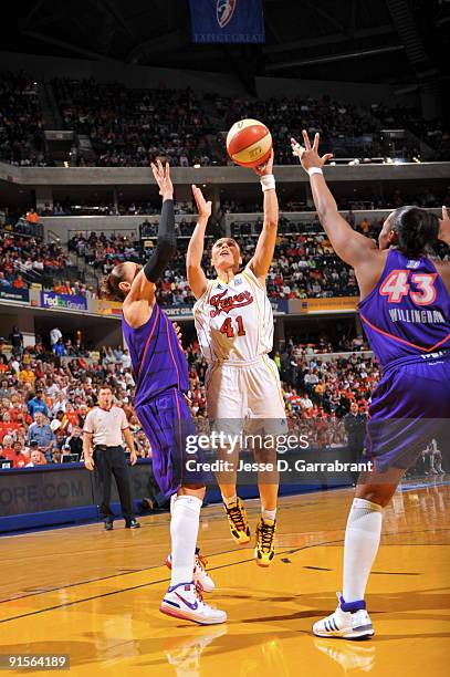 Tully Bevilaqua of the Indiana Fever shoots against Diana Taurasi of the Phoenix Mercury during Game Four of the WNBA Finals on October 7, 2009 at...