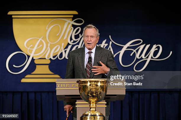 Former President George H.W. Bush speaks during the opening ceremonies for The Presidents Cup at Harding Park Golf Club on October 7, 2009 in San...
