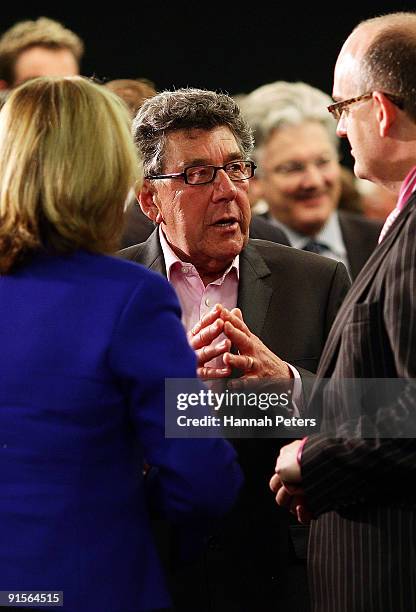 Broadcaster Paul Holmes talks with Police Minister Judith Collins and Health Minister Tony Ryall after listening to New Zealand Prime Mininster John...