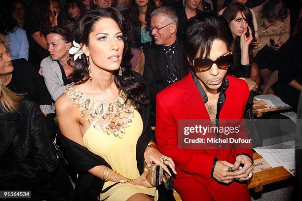 Bria Valente and Prince attend John Galliano Pret a Porter show as part of the Paris Womenswear Fashion Week Spring/Summer 2010 at Halle Freyssinet...